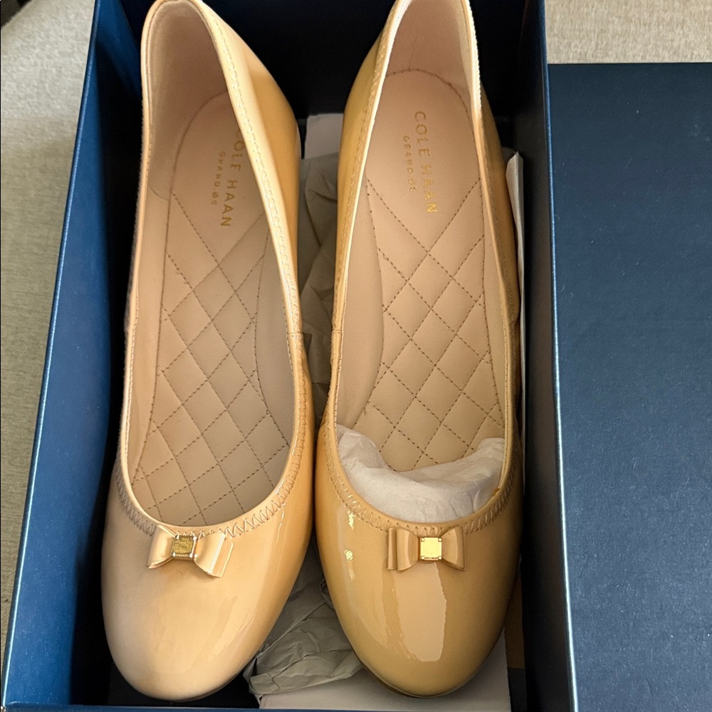 Cole Haan Women's Tan Patent Wedge shoe.